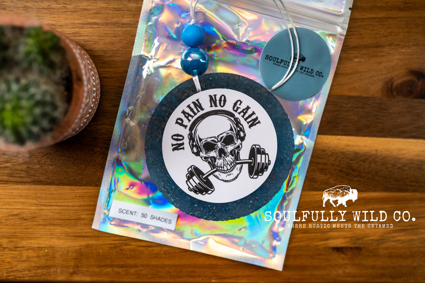 Soulful Air Freshener: Circle "No Pain, No Gain" Skull/Weights (Scent: 50 Shades)