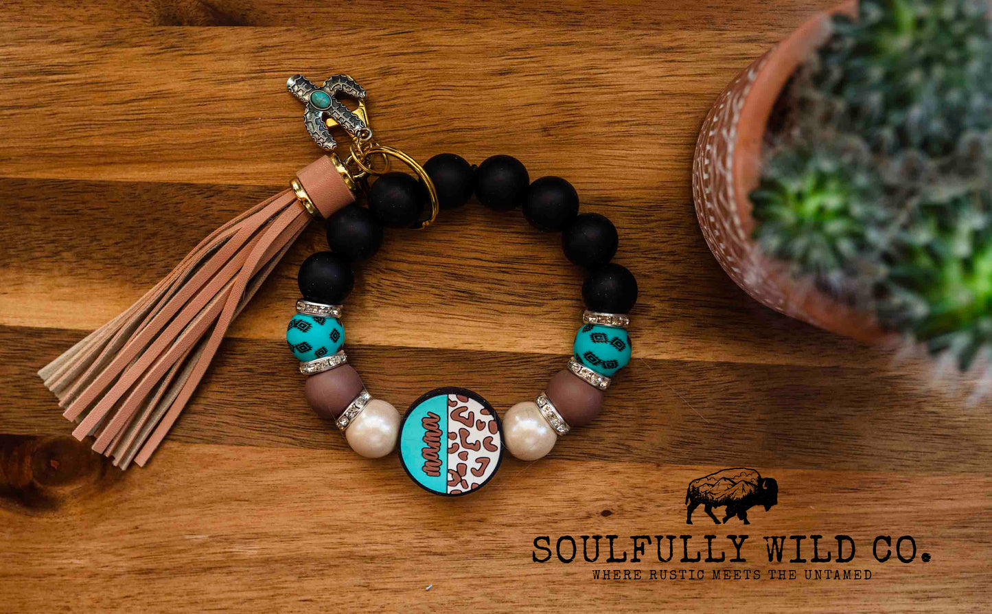 Wild Soul Keychain - Cow print, Black and Turquoise Aztec Mama Wristlet