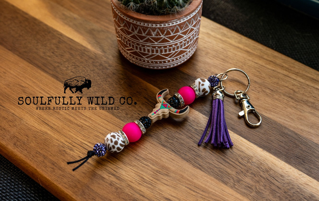 Wild Soul Keychain - Bullhead, Print, cow print and Purple Tassel