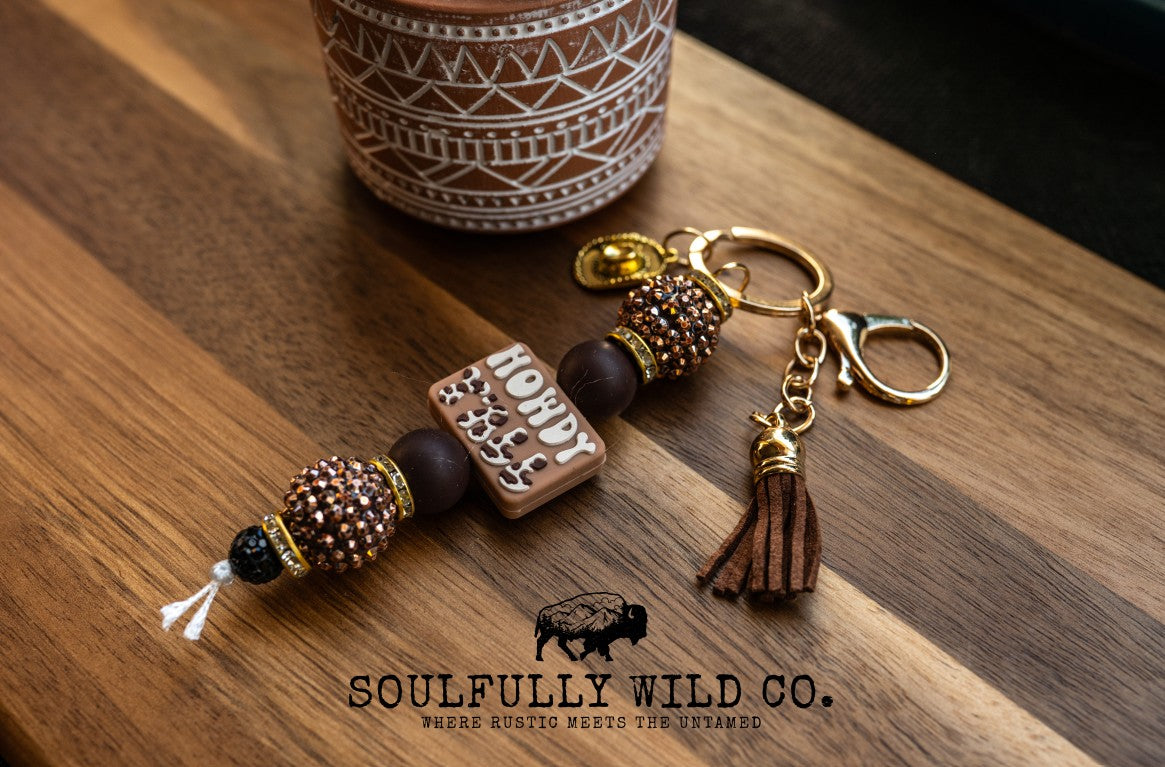 Wild Soul Keychain - Howdy Yall, Gold Cowboy Charm, Brown Tassel