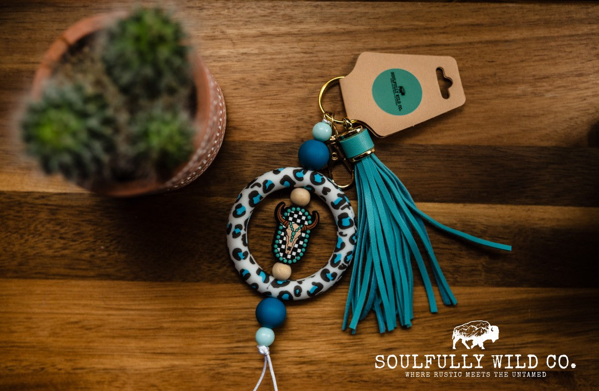 Wild Soul Keychain -Silicone Circle (Blue and Black Cow Print) with Bullhead