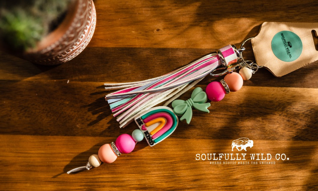 Wild Soul Keychain -"Be Kind" Rainbow with Turquoise Bow with Rainbow Tassel