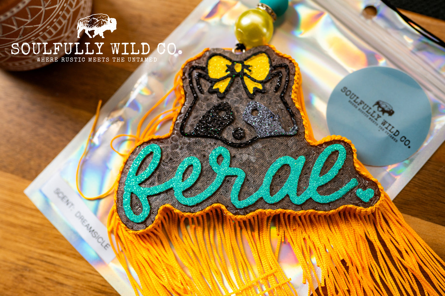 Soulful Air Freshener: "Feral" Raccoon, Yellow and Turquoise (Scent: Dreamsicle)