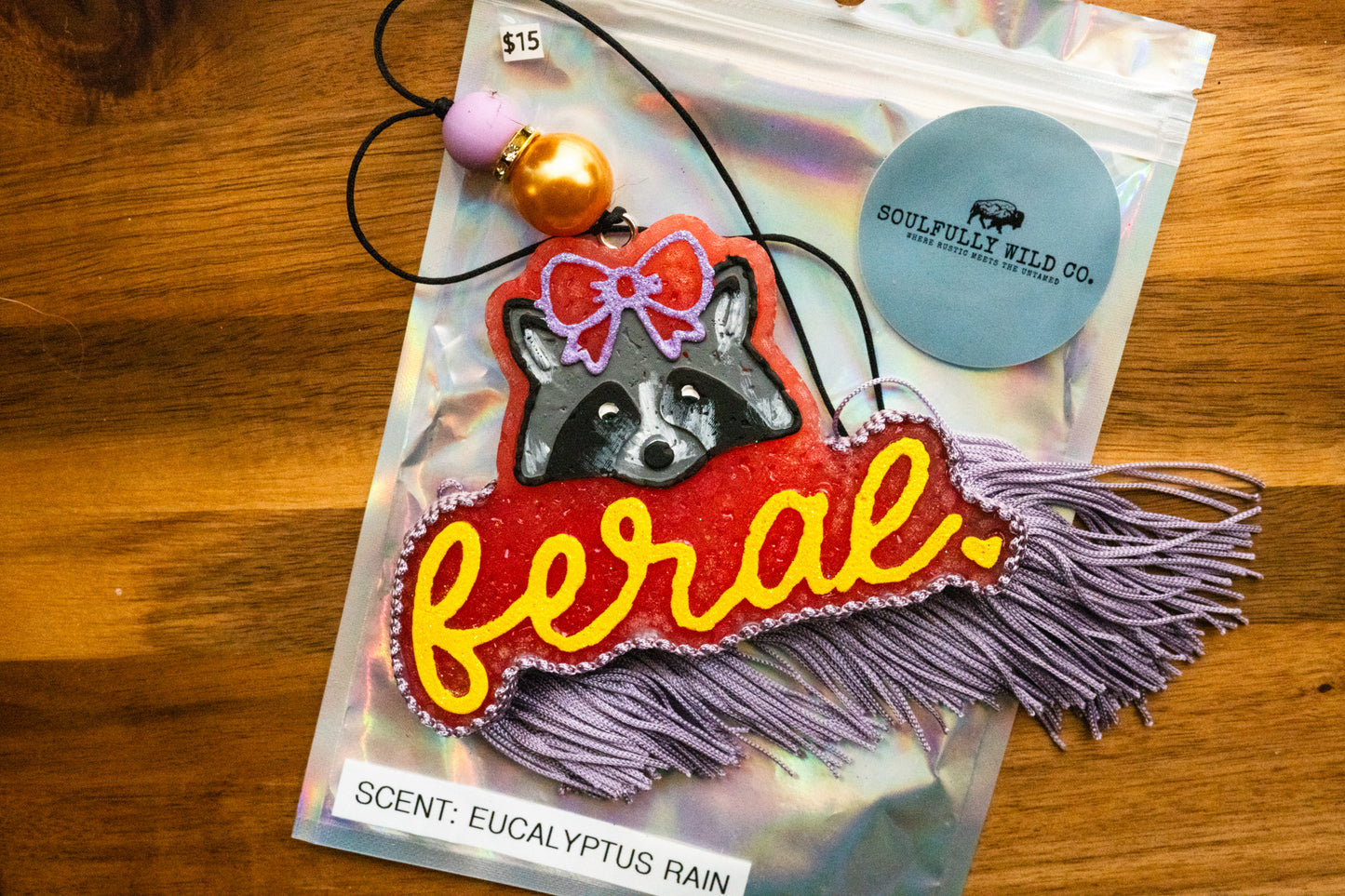 Soulful Air Freshener: Feral Raccoon - Red, Purple and Yellow (Scent: Eucalyptus Rain)