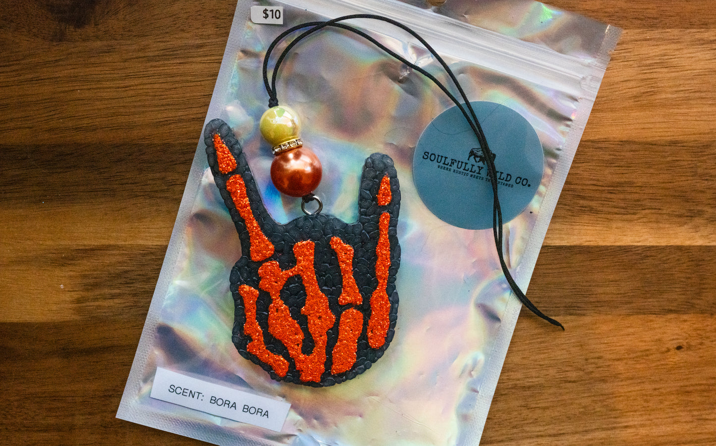 Soulful Air Freshener: Skelton Hand Black/Orange (Scent: Bora Bora)