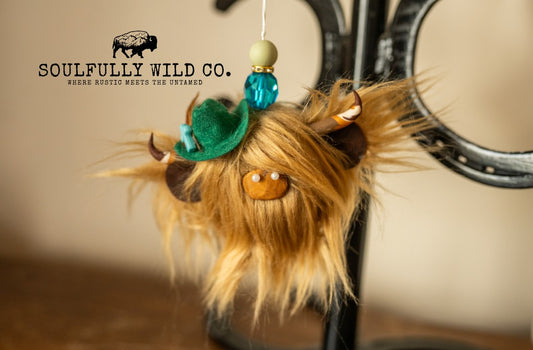 Travel Moo - Reddish, Green Cowboy Hat, Turquoise Cross & Feathers