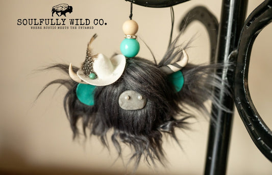 Travel Moo - Dark Grey, White Cowboy Hat with Turquoise Stone & Feathers.