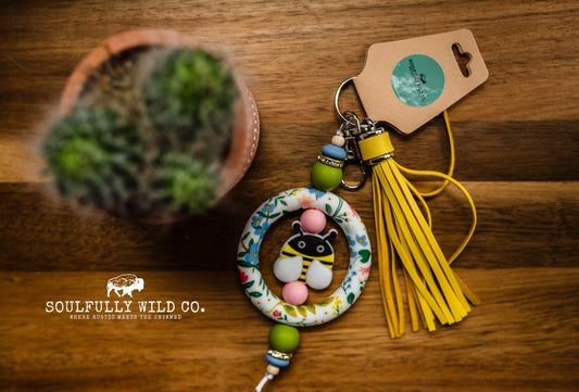 Wild Soul Keychain - Silicone Circle Flowers and Bee with Yellow Tassel