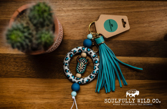 Wild Soul Keychain -Silicone Circle (Blue and Black Cow Print) with Bullhead