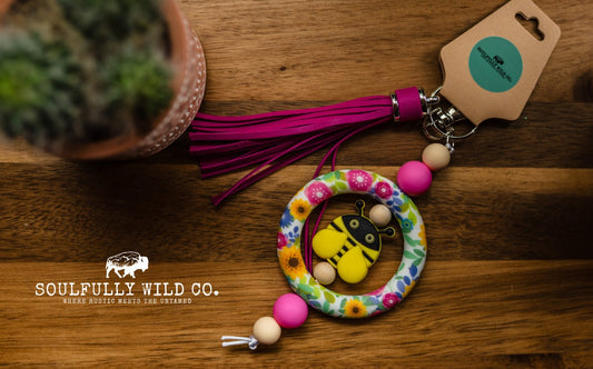 Wild Soul Keychain - Silicone Circle Pink/Yellow and Blue Flowers with Yellow Bee