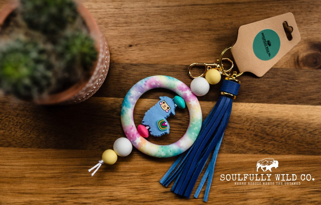 Wild Soul Keychain - Silicone Circle Rainbow Stars with Blue Llama