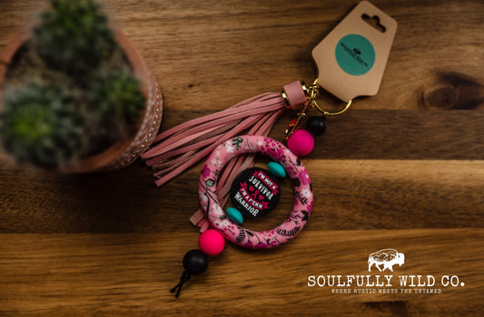 Wild Soul Keychain - Silicone Circle Pink "I'm Not A Survivor I'm a F*ckin Warrior"