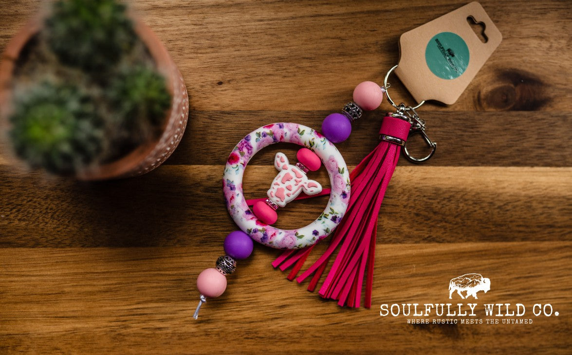 Wild Soul Keychain - Silicone Circle Pink/Purple Flowers and Pink Cow Head