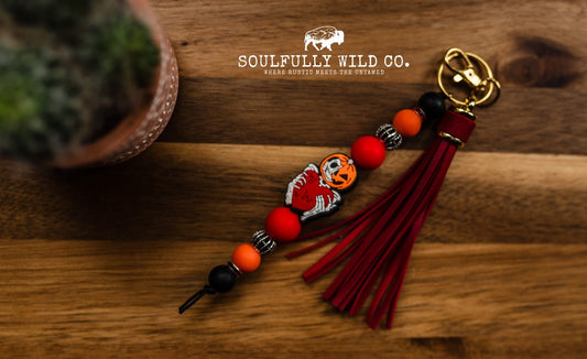 Wild Soul Keychain - Pumpkin Head Skelton with Red Tassel