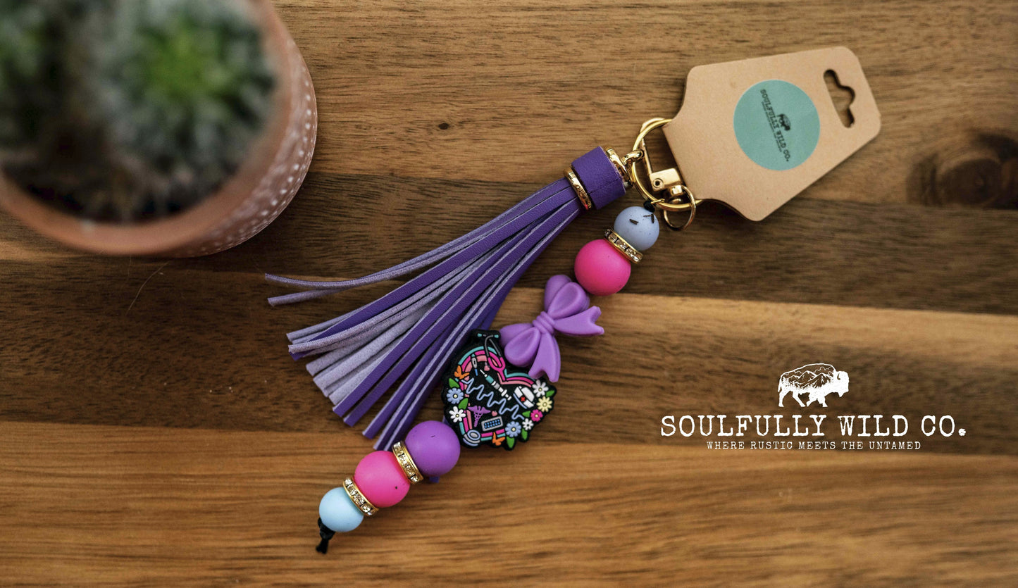 Wild Soul Keychain - Nurse Heart with Purple Ribbon